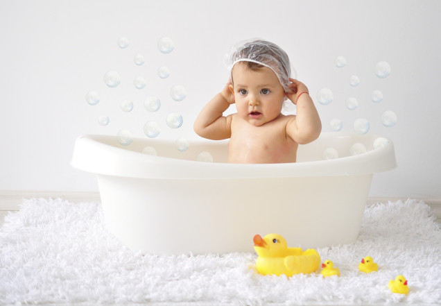 Adorable Baby Girl Taking a Bath